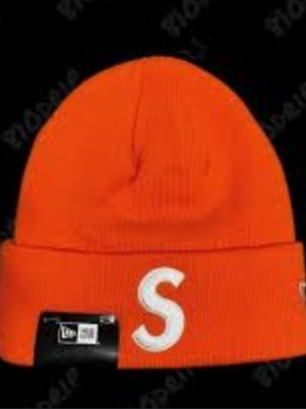 Supreme x New Era "S Logo" beanie in orange, featuring an embroidered logo on th